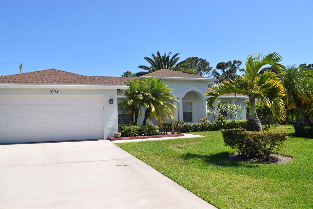 Photo of 1074 SW Janar Avenue, Port Saint Lucie, FL 34953 (MLS # R11128830)