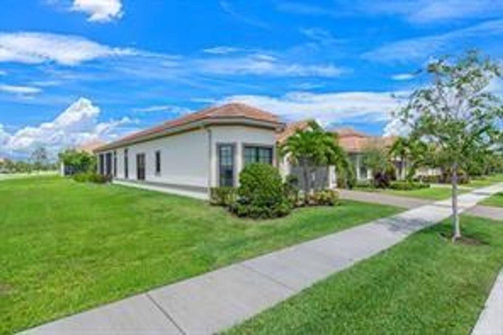 Photo of 11975 Vivar Run, Parkland, FL 33076 (MLS # F10534266)