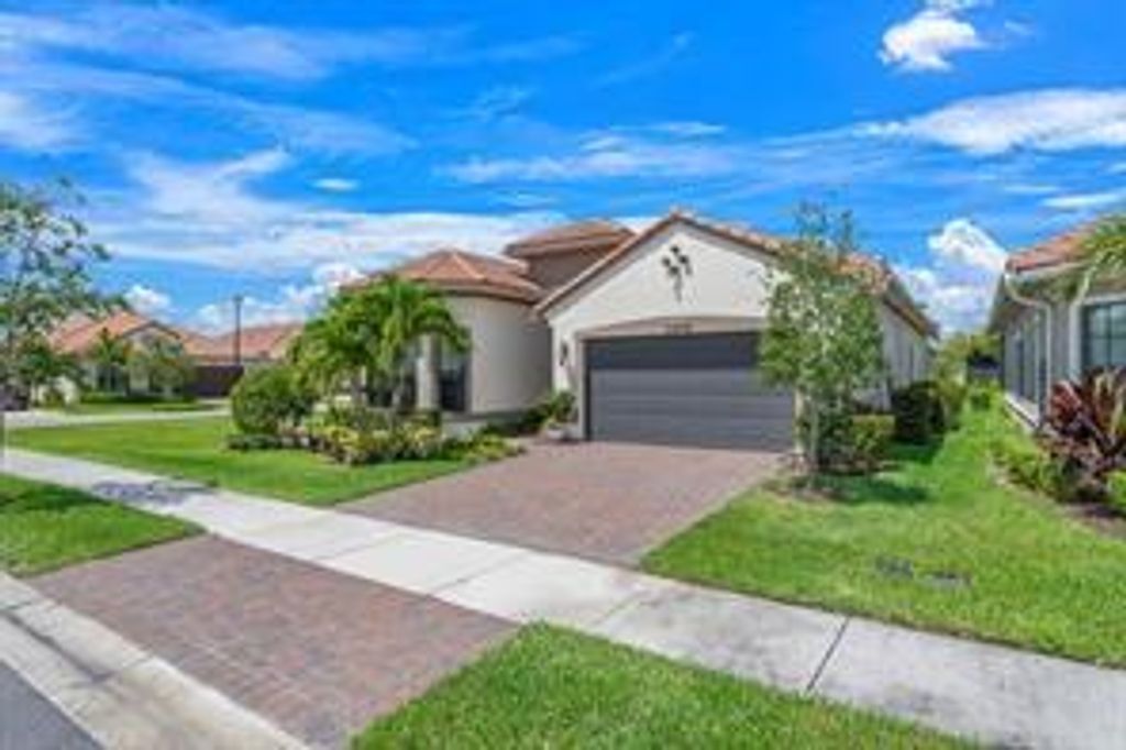 Photo of 11975 Vivar Run, Parkland, FL 33076 (MLS # F10534266)