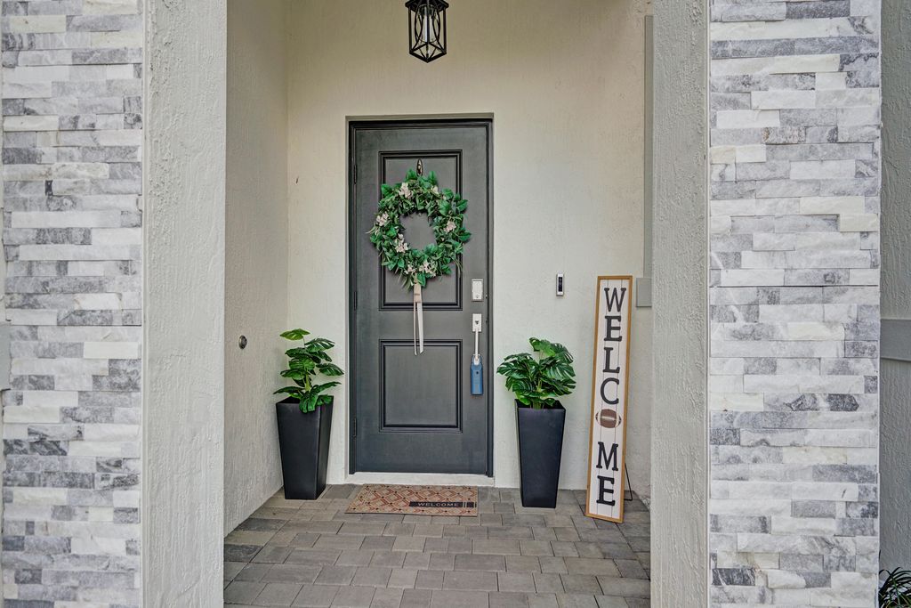 Photo of 11966 NW 47th Manor, Pompano Beach, FL 33076 (MLS # R11165951)