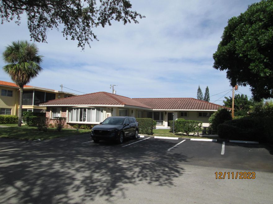 Immediate Income / well-maintained updated Triplex on beautiful Oak Tree Line street.  Located in the sought-after community of Lighthouse Point Estates. All three units have updated bathrooms, kitchen cabinets with granite, tile throughout as well as windows and doors. Hurricane shutters. All have their own laundry, central A/C. Recently paved six parking spaces, private green space for tenants plus 2 sheds. CBS construction with tile roof. The landlord pays sewer water trash and landscapers. East of US - 1 and 2.4 miles to the beach. Whole Foods and Publix are within walking distance as are a multitude of great places to dine. LHP is known for safe neighborhoods with its own police, fire department, parks, marina district. PLEASE do not disturb the tenants.    Long-term tenants on a month-to-month want to stay. NO HOA! Possible owner financing for the right terms and conditions. Rents are considered below market value. Buyer and agent to verify all information. Buyer to verify all measurements. Please do not STOP & disturb the tenants. The average monthly water bill is $160.