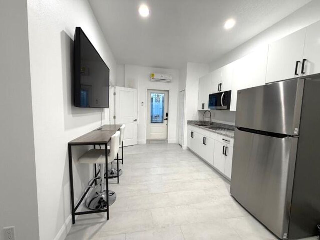 Photo of 3418 SW Englewood Street, Port Saint Lucie, FL 34953 (MLS # B26006576)