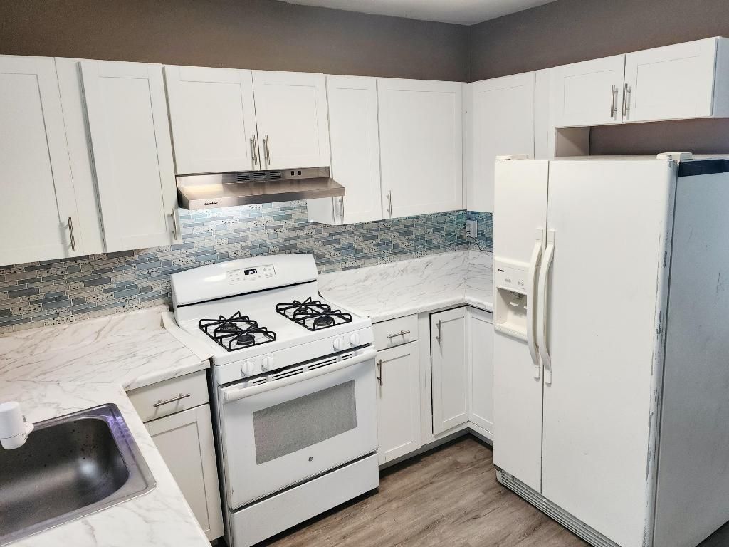 Photo of 664 W 2nd Street, Riviera Beach, FL 33404 (MLS # R11132607)