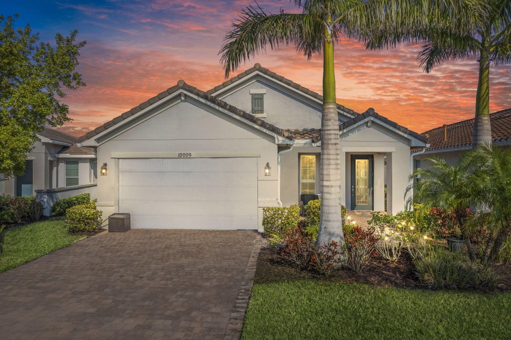 Photo of 10009 SW Trumpet Tree Circle, Port Saint Lucie, FL 34987 (MLS # R11122378)