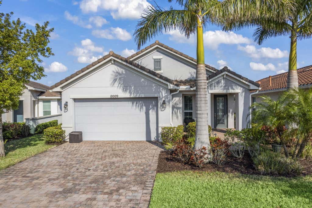 Photo of 10009 SW Trumpet Tree Circle, Port Saint Lucie, FL 34987 (MLS # R11122378)