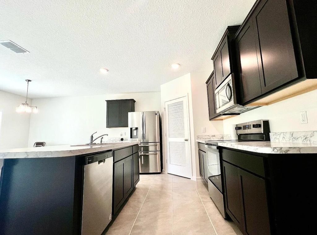 Photo of 498 Periwinkle Drive, Sebastian, FL 32958 (MLS # R11095456)