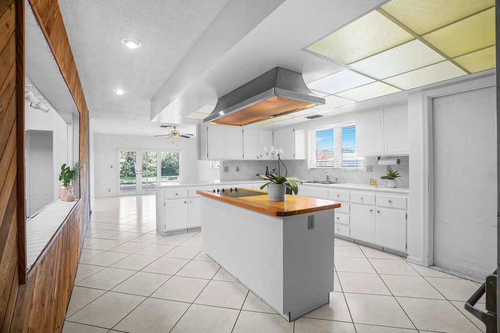 Photo of 1000 SW Mulberry Way, Boca Raton, FL 33486 (MLS # R11079332)