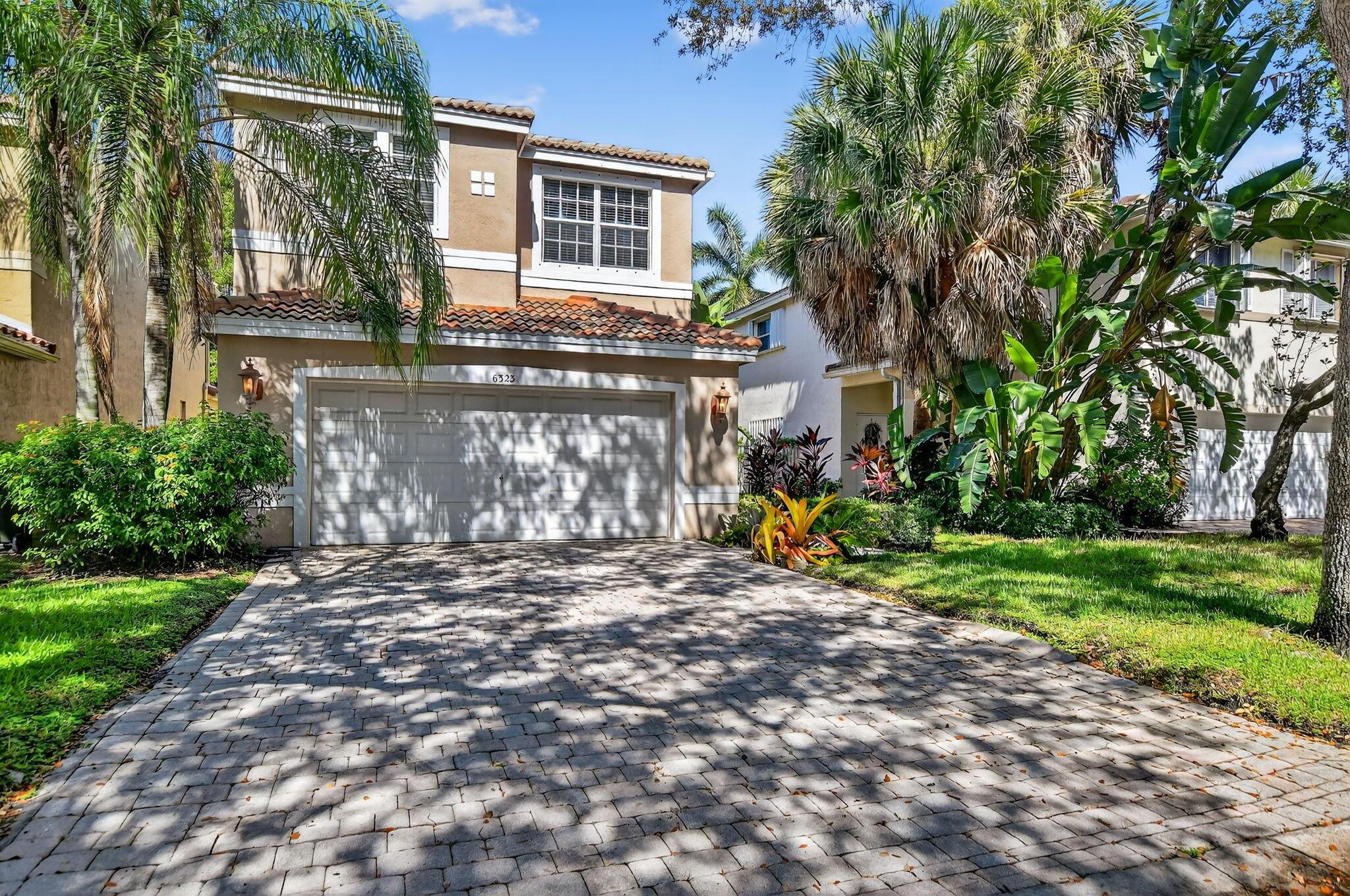 Discover your slice of paradise in this 3-bedroom, 2 1/2 bathroom home located in the desirable CocoBay community in Coconut Creek. This quaint home offers 2,074 living square feet of beautifully designed living space on a 4,703 square foot lot. Step into a world of tranquility with outstanding water views from your backyard, perfect for soaking up serene vibes from your private spa. You'll love being part of a great family community that's not only friendly but also conveniently close to shopping. You'll find every inch of its space is full of potential to create your dream living environment. Don't miss out on this unique opportunity to own a piece of Florida paradise!