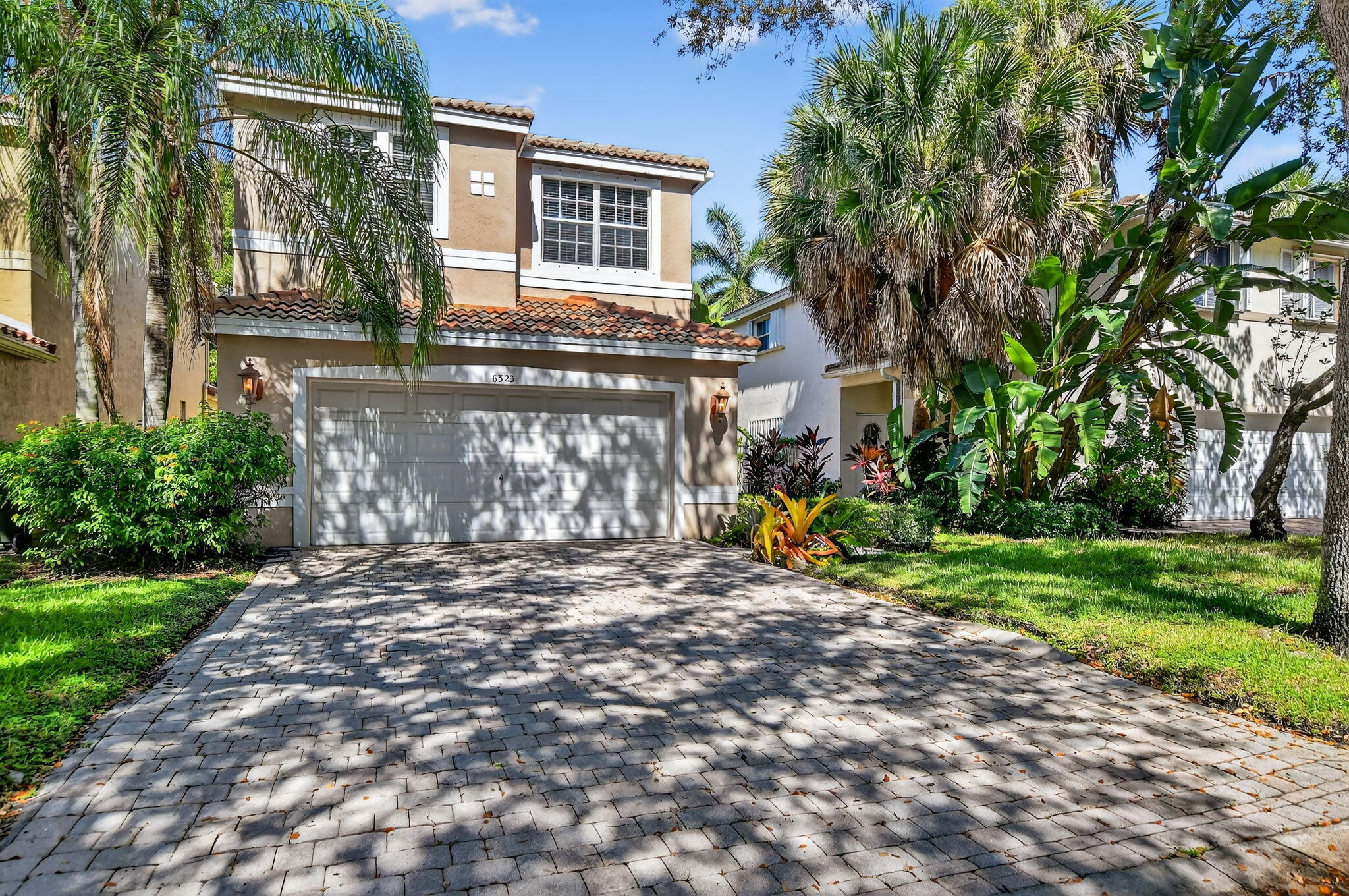 Discover your slice of paradise in this 3-bedroom, 2 1/2 bathroom home located in the desirable CocoBay community in Coconut Creek. This quaint home offers 2,074 living square feet of beautifully designed living space on a 4,703 square foot lot. Step into a world of tranquility with outstanding water views from your backyard, perfect for soaking up serene vibes from your private spa. You'll love being part of a great family community that's not only friendly but also conveniently close to shopping. You'll find every inch of its space is full of potential to create your dream living environment. Don't miss out on this unique opportunity to own a piece of Florida paradise!