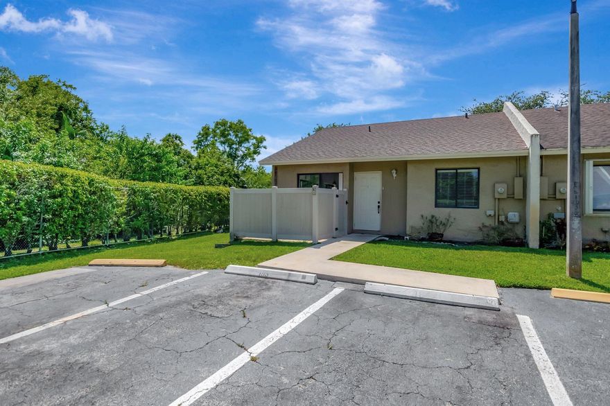 Available starting May 1st! This bright and spacious 2-bed, 2-bath townhome in Boca Raton features an open floor plan with a beautifully updated kitchen complete with stainless steel appliances, white shaker cabinets, quartz countertops, and a deep farmhouse sink. Large windows and sliding glass doors fill the space with natural light and lead to a screened-in patio with tile flooring and ceiling fans, perfect for relaxing or entertaining. The home offers neutral finishes throughout and tile floors in the main areas, making it easy to personalize. Enjoy the convenience of 2 assigned parking spaces and a peaceful, green outdoor view. Located in a desirable Boca Raton neighborhood close to shopping, dining, and top schools. Don't miss out on this move-in ready gem!