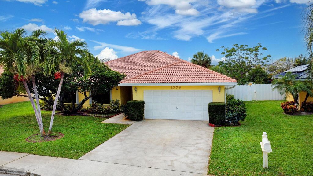 Photo of 1779 Pierce Drive, Lake Worth Beach, FL 33460 (MLS # R11064645)