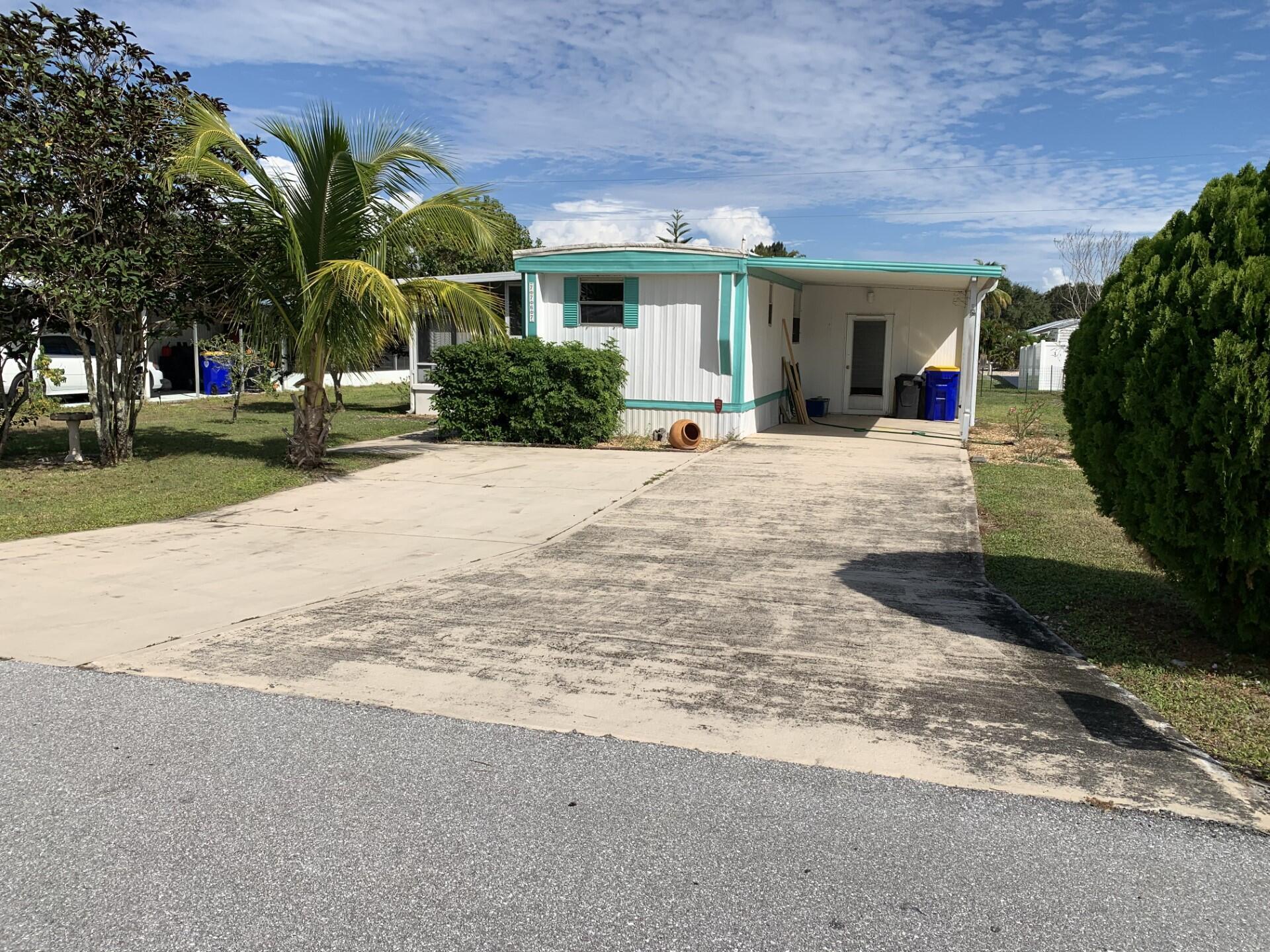 Cute partially furnished 2 bedroom, 1 and a half bath, attached covered parking for 2 cars. Screened side patio, additional open front patio. Washer Dryer in attached storage room. Available for annual rental. All fees due prior to move-in.