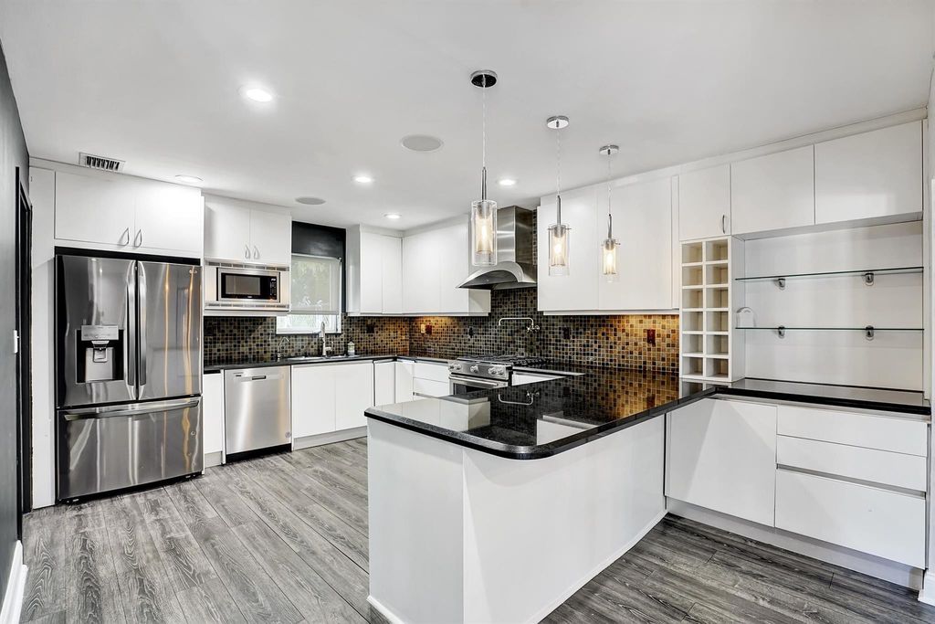 Photo of 777 SW 7th Street, Boca Raton, FL 33486 (MLS # R10999840)