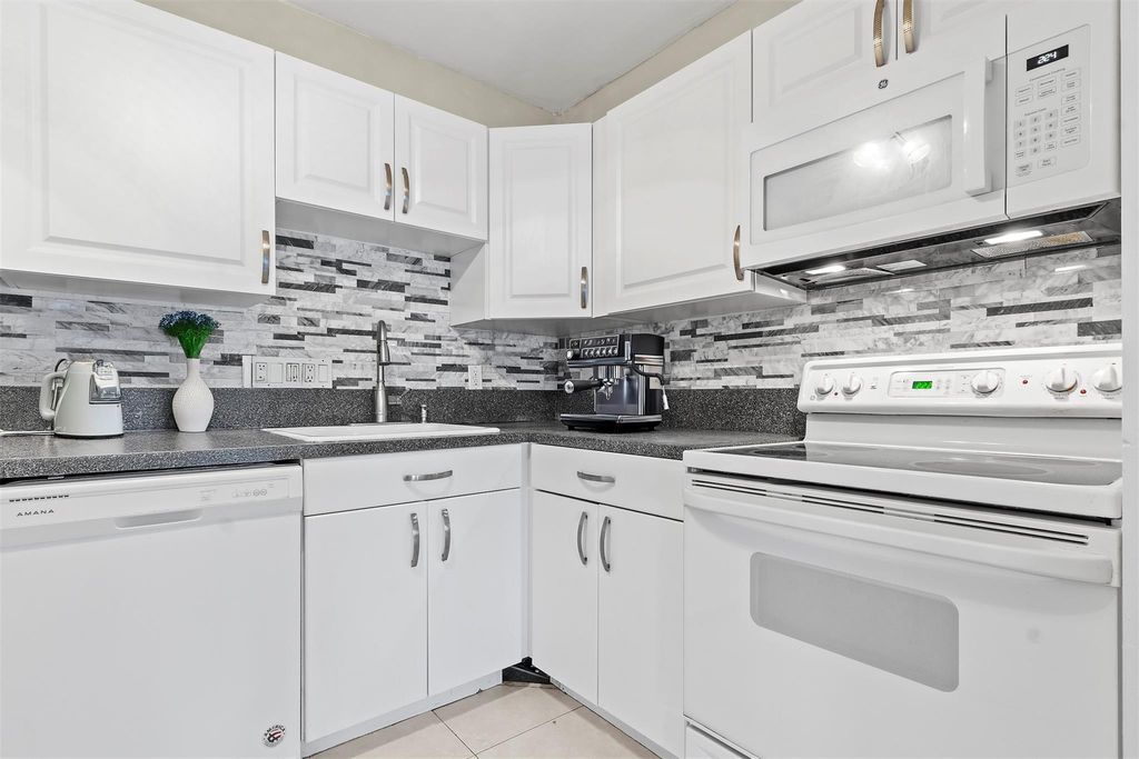 Photo of 751 Pine Dr #204, Pompano Beach, FL 33060 (MLS # F10523370)