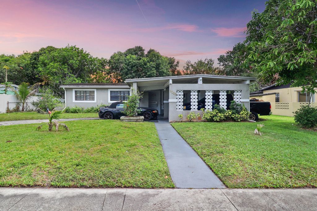 Photo of 4710 NW 11th Place, Lauderhill, FL 33313 (MLS # B26024247)