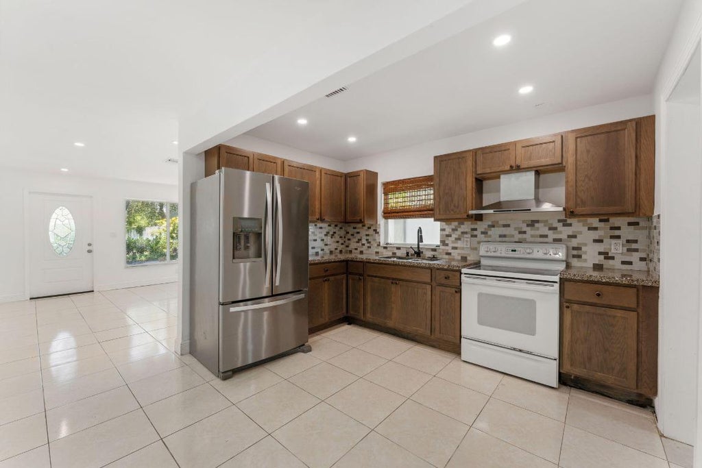 Photo of 441 NW 1st Way, Deerfield Beach, FL 33441 (MLS # R10994899)