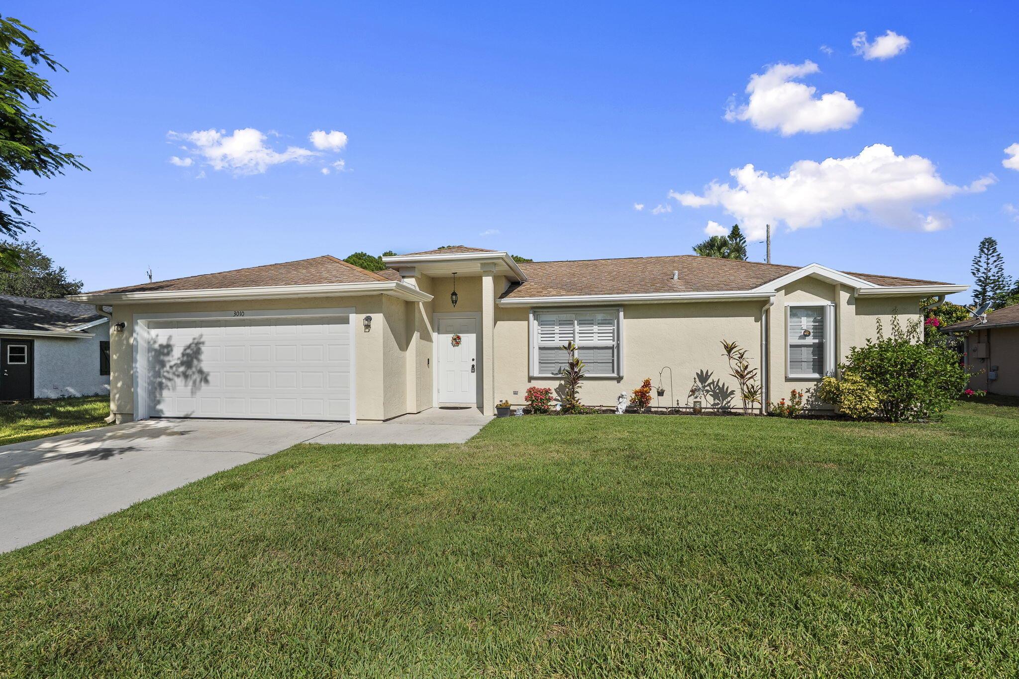 Set on a quiet street in an established neighborhood with no HOA, this well-maintained 3-bedroom, 2-bath home has been well cared for and features thoughtful details throughout. Inside, you'll find fresh interior paint, crown molding, and plantation shutters throughout, adding a polished touch to every room. The exterior has also been recently painted, boosting the home's curb appeal and overall charm. The kitchen features granite countertops, stainless steel appliances, and a layout that makes both daily living and entertaining a breeze. A 2022 A/C system, 2021 water heater, and full accordion shutters provide lasting value and storm protection. The split floor plan offers privacy for the primary suite, while a screened-in patio and fully fenced yard create the perfect outdoor retreat
