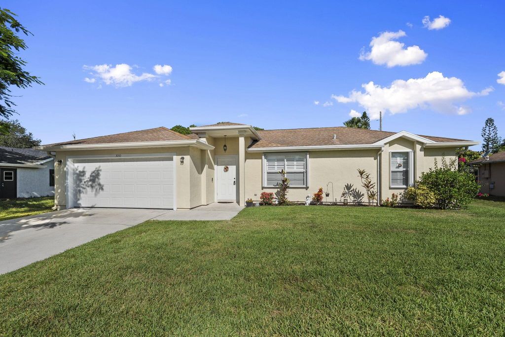 Photo of 3010 SW Briggs Street, Port Saint Lucie, FL 34953 (MLS # R11113345)
