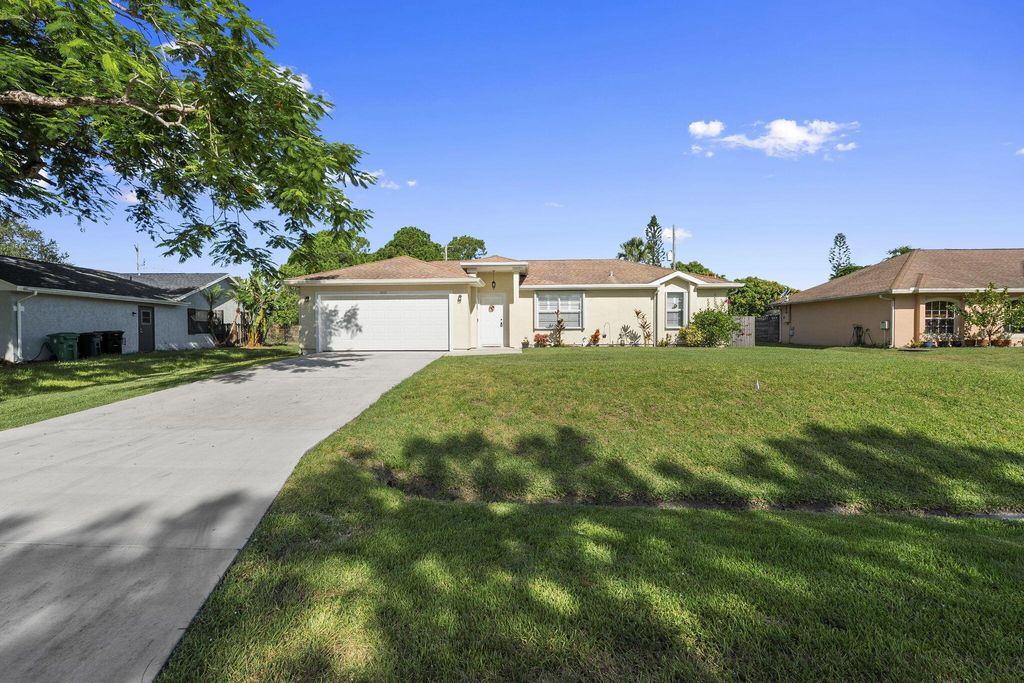 Photo of 3010 SW Briggs Street, Port Saint Lucie, FL 34953 (MLS # R11113345)
