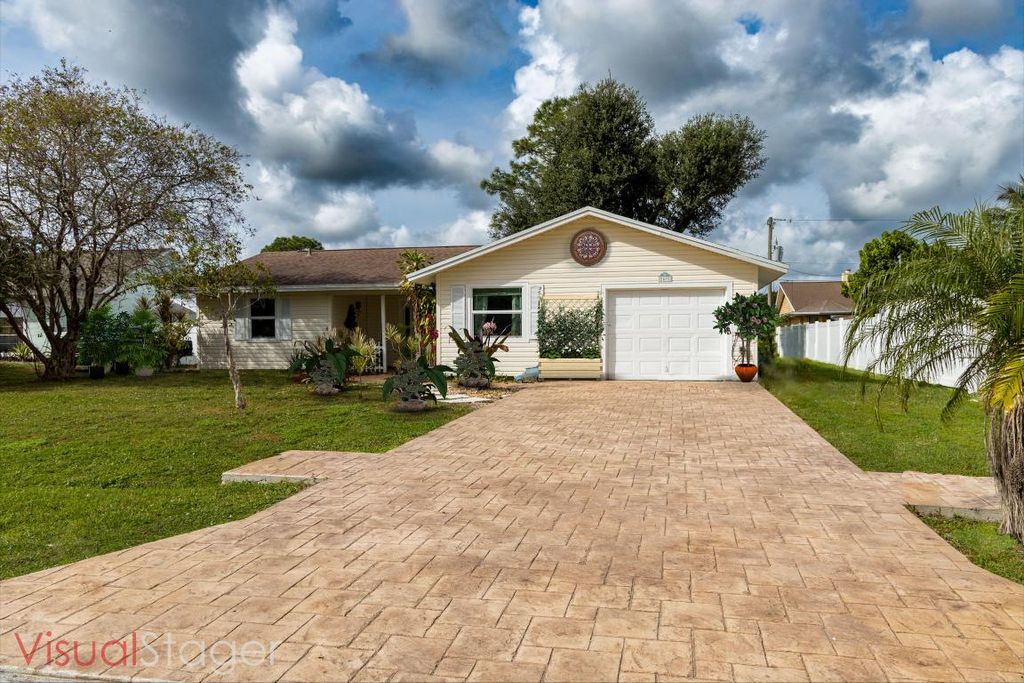 Photo of 2490 SE Whitehorse Street, Port Saint Lucie, FL 34984 (MLS # R10959291)