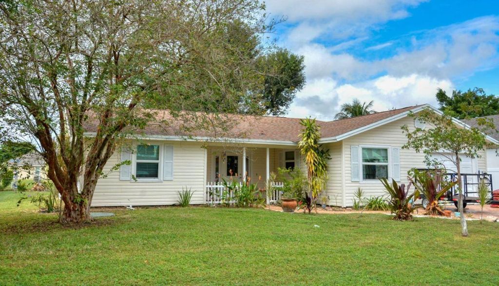 Photo of 2490 SE Whitehorse Street, Port Saint Lucie, FL 34984 (MLS # R10959291)