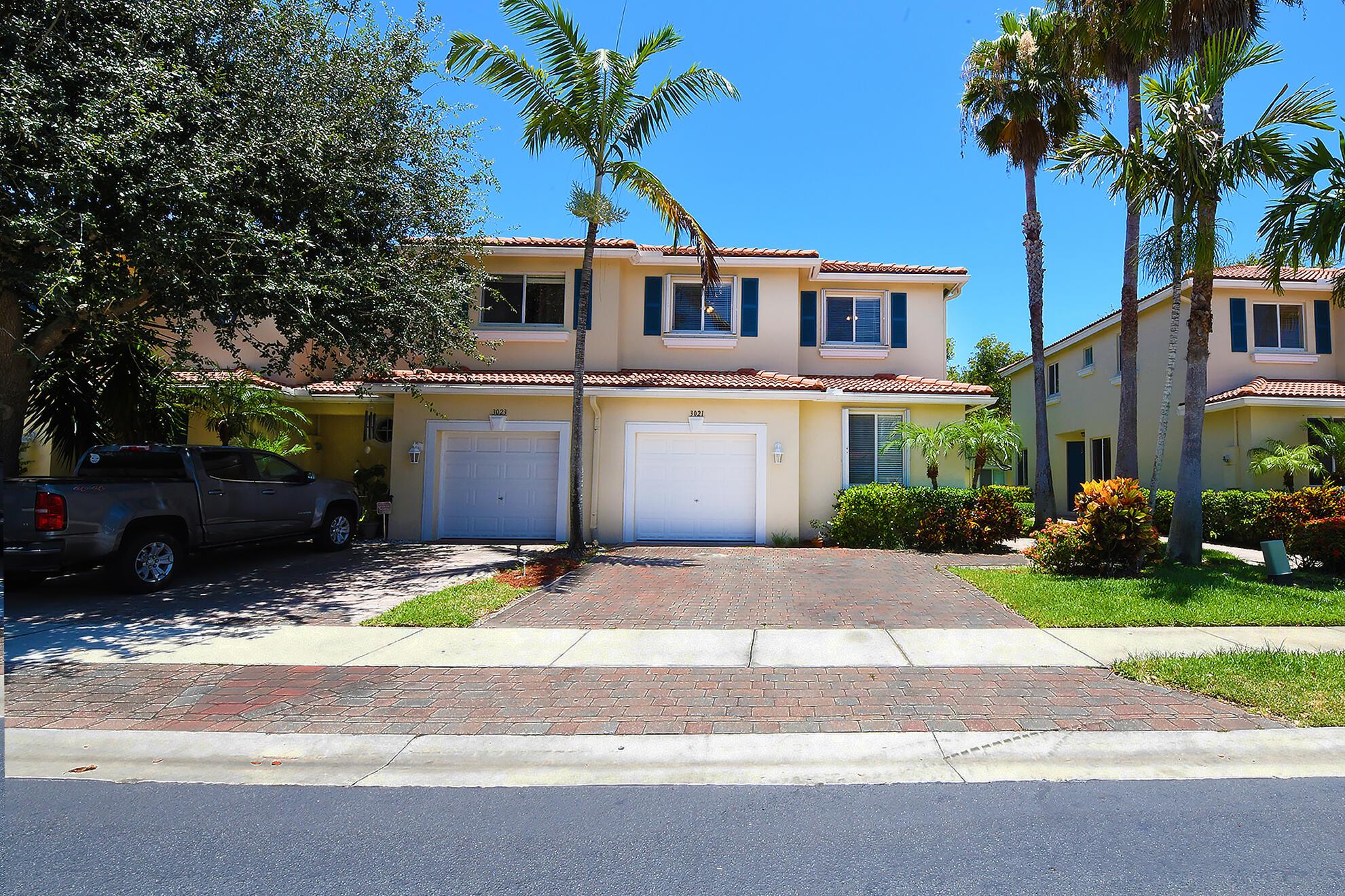 Very desirable, light and bright SE exposure corner home w/garage and 2 car decorative driveway & amazing huge green views from your patio so nice for entertaining. Rarely available upgraded model features Italian stone tile, granite counter tops & SS appliances in the Chefs kitchen. 3 BR, large loft and full size W&D room are upstairs. Accordion shutters for your convenience. Steps to resort style pool, fittness, tot lot, just minutes to hottest downtown Rennaissance commons fine shopping, dining, entertaining, I-95 and the beach.