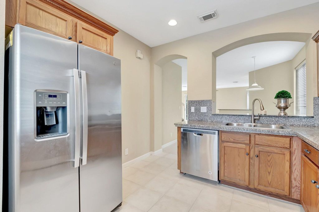 Photo of 3021 N Evergreen Circle, Boynton Beach, FL 33426 (MLS # R11091053)