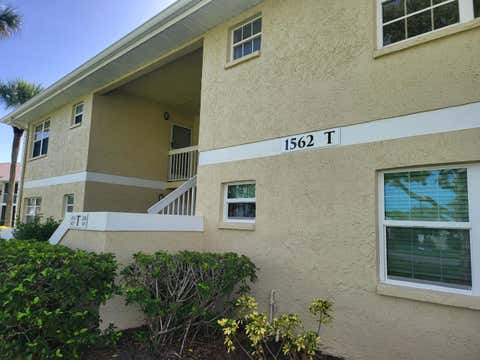 Photo of 1562 SE Royal Green Circle #201, Port Saint Lucie, FL 34952 (MLS # B26051513)