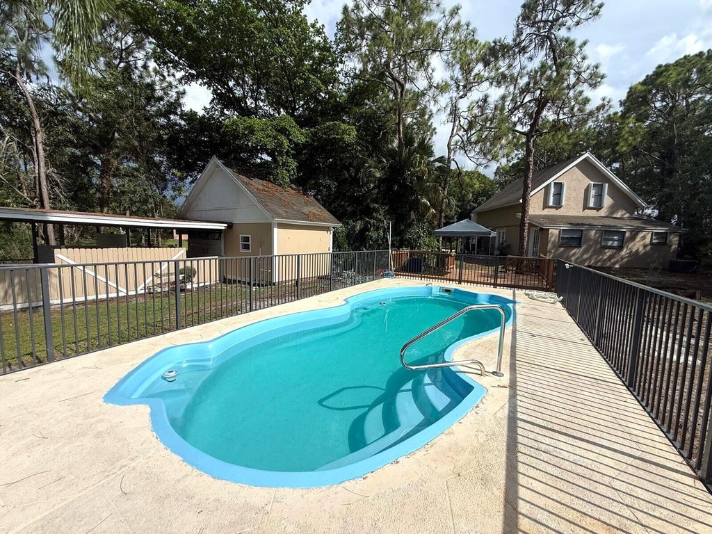 Photo of 17503 30th Lane N, Loxahatchee, FL 33470 (MLS # B26086919)
