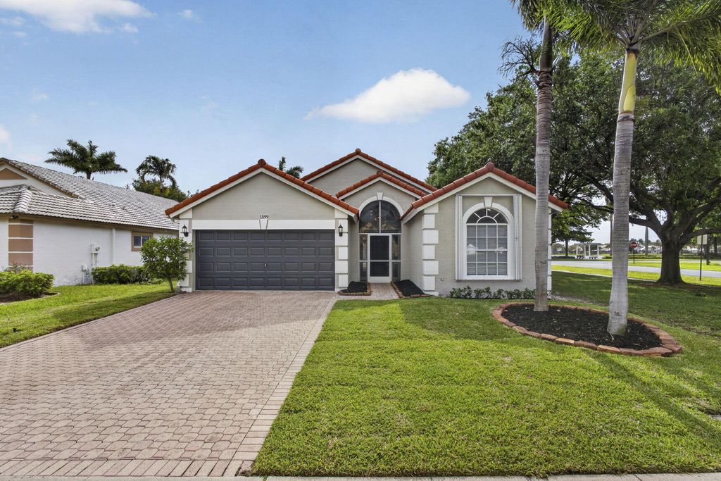 Photo of 1599 Oak Berry Circle, Wellington, FL 33414 (MLS # B26013646)