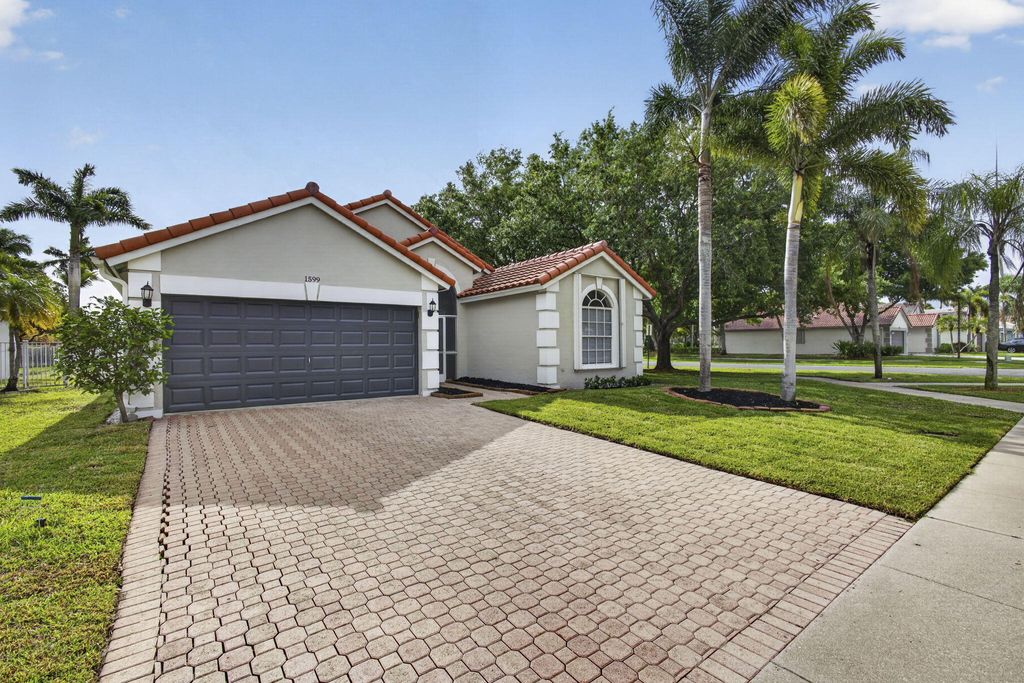 Photo of 1599 Oak Berry Circle, Wellington, FL 33414 (MLS # B26013646)