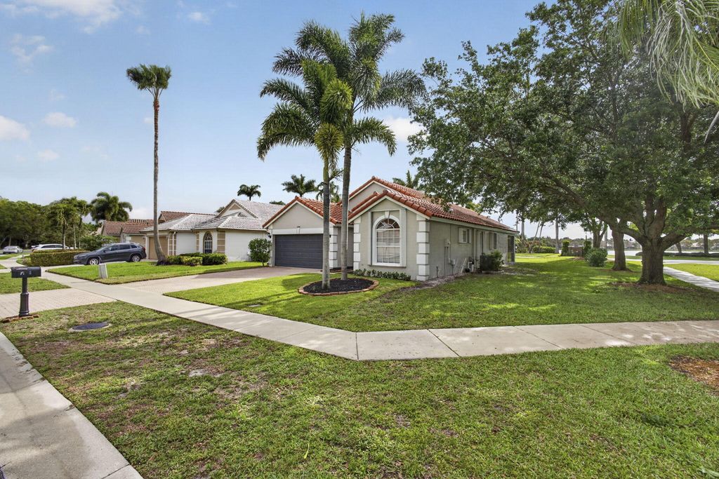 Photo of 1599 Oak Berry Circle, Wellington, FL 33414 (MLS # B26013646)