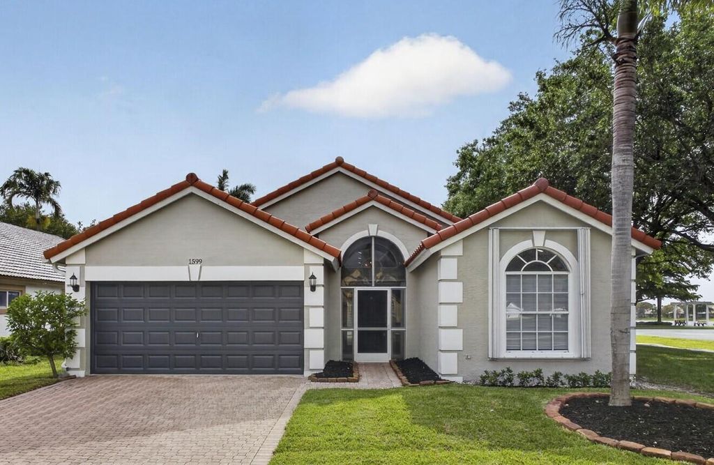 Photo of 1599 Oak Berry Circle, Wellington, FL 33414 (MLS # B26013646)