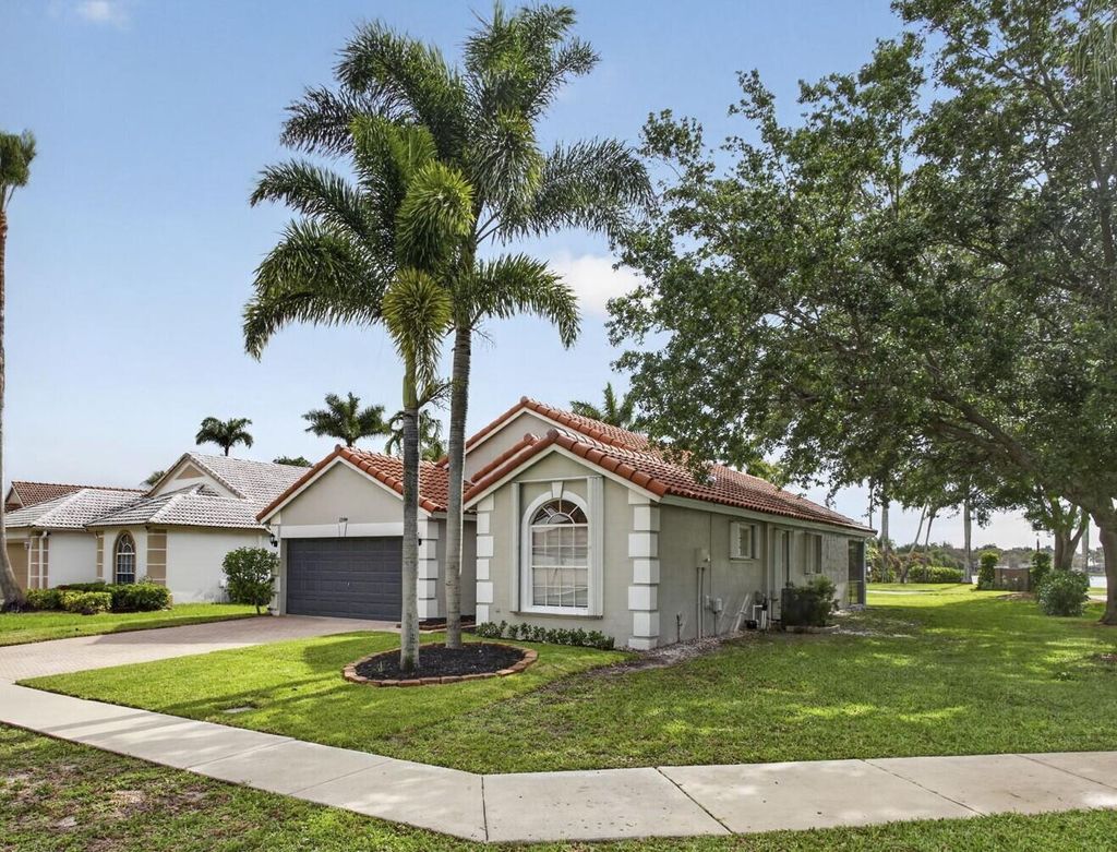 Photo of 1599 Oak Berry Circle, Wellington, FL 33414 (MLS # B26013646)