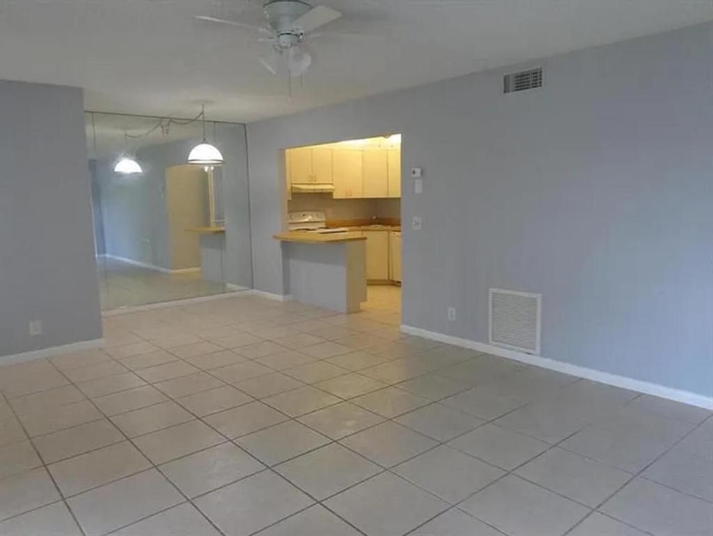 Photo of 3560 Pine Needle Drive #D1, Greenacres, FL 33463 (MLS # R11133475)