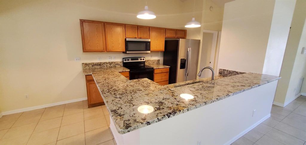 Photo of 790 SW Hibiscus Street, Port Saint Lucie, FL 34983 (MLS # R11019662)