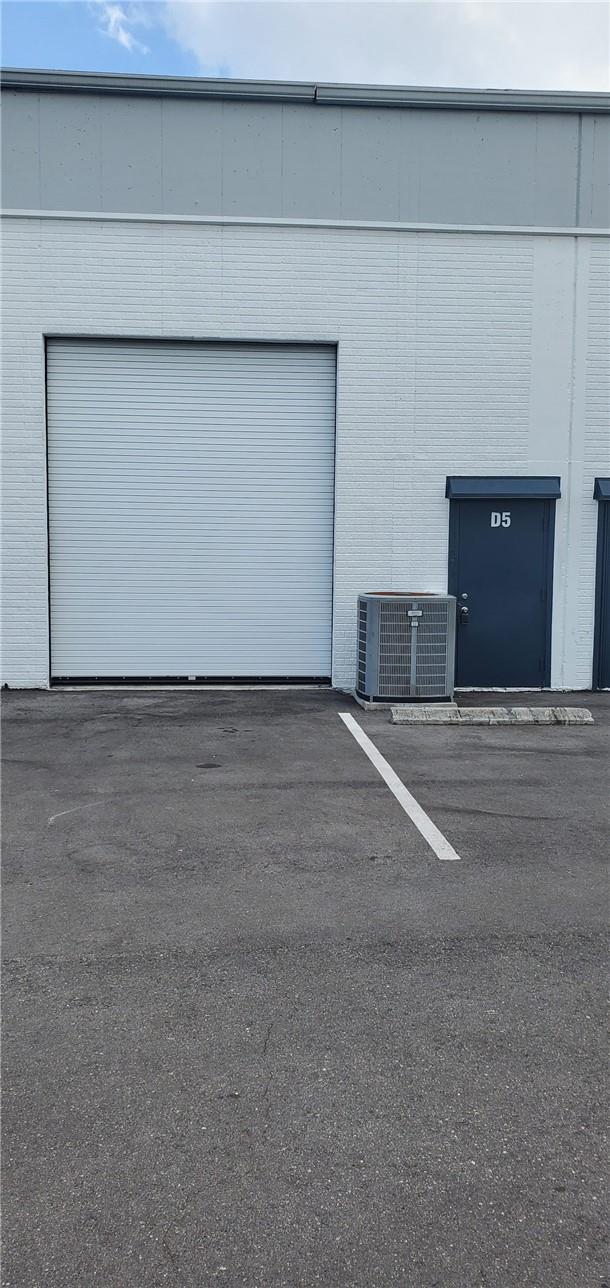 Small Bay warehouse in Deerfield Beach comes with new 10' x 12' overhead/drive-through door (installed May 2022), LED lighting, entrance door, restroom and one parking space. This unit is fully air conditioned. Water/Sewer/Trash $2.25 PSF