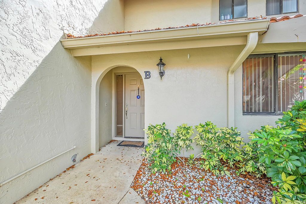 Photo of 5631 Coach House Circle #B, Boca Raton, FL 33486 (MLS # R10982542)