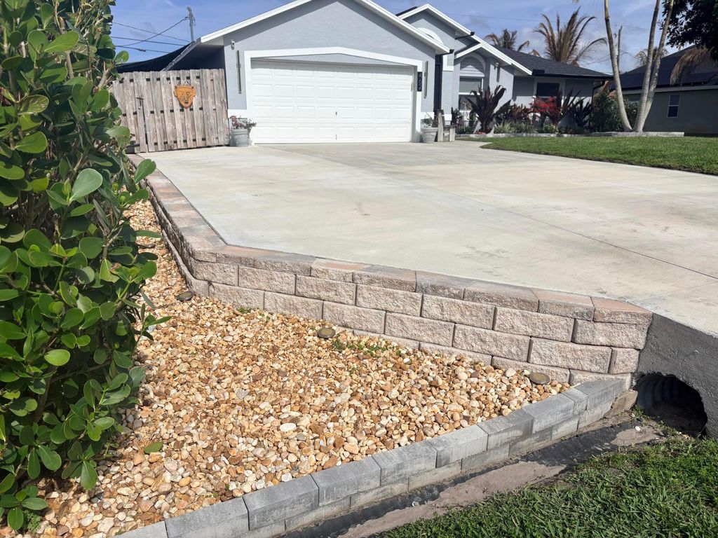 Photo of 462 SE Cork Road, Port Saint Lucie, FL 34984 (MLS # B26005316)