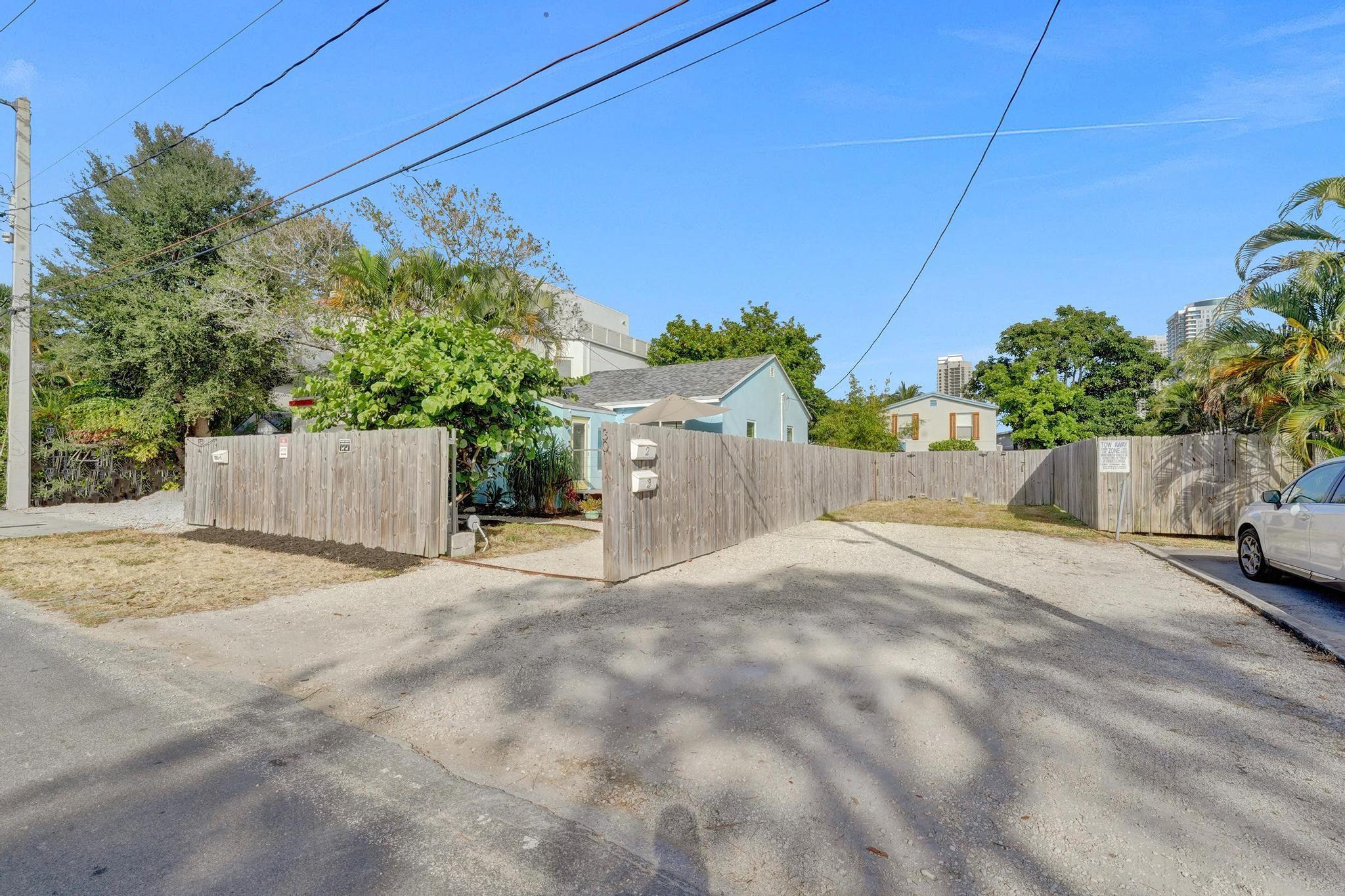 Downtown Fort Lauderdale/ Tarpon River prime property! This unique opportunity offers a turn key addition to your portfolio fetching premium rent rates or the ideal classic South Florida home while collecting income. A charming Old Florida 2/1 house recently pampered while holding onto the "South Florida charm". The neighboring building, is a two story duplex, both units being a 1/1 with shared laundry. An oversized downtown lot with incredible future development potential. A true "turn key" property with no deferred maintenance. The lot itself is roughly 7500sqft with gorgeous views of Downtown. This property has you in the epicenter of all that Fort Lauderdale has to offer! Contact us today for private viewing!