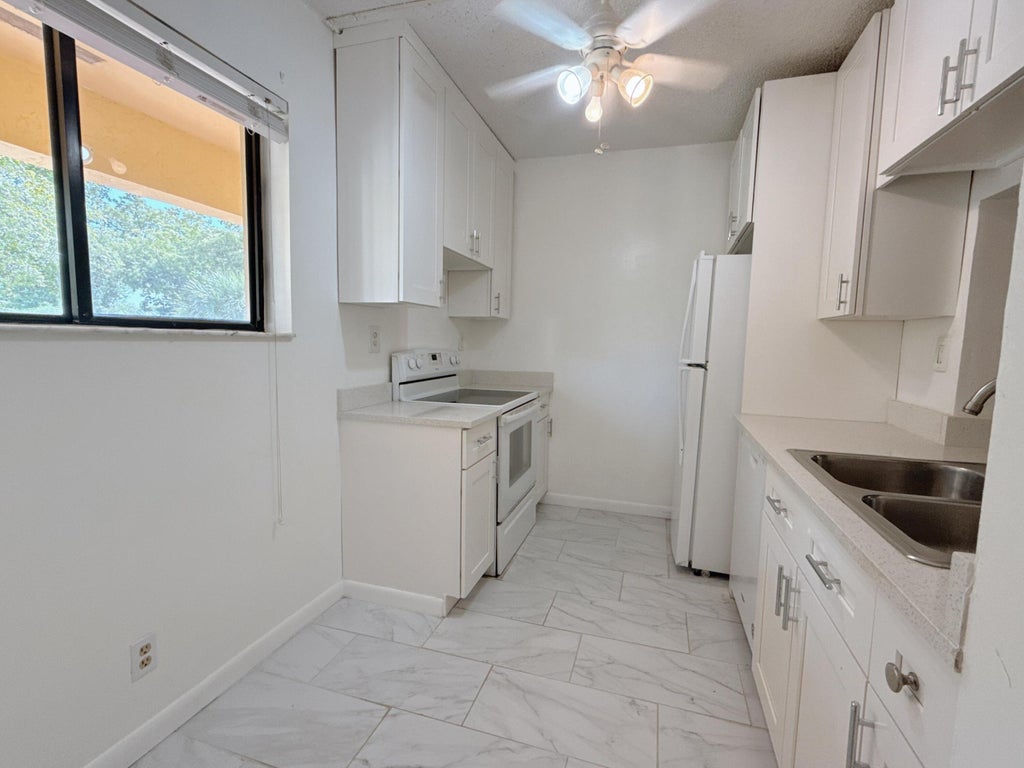 Photo of 924 SW 9th Street Circle #204, Boca Raton, FL 33486 (MLS # R11074762)