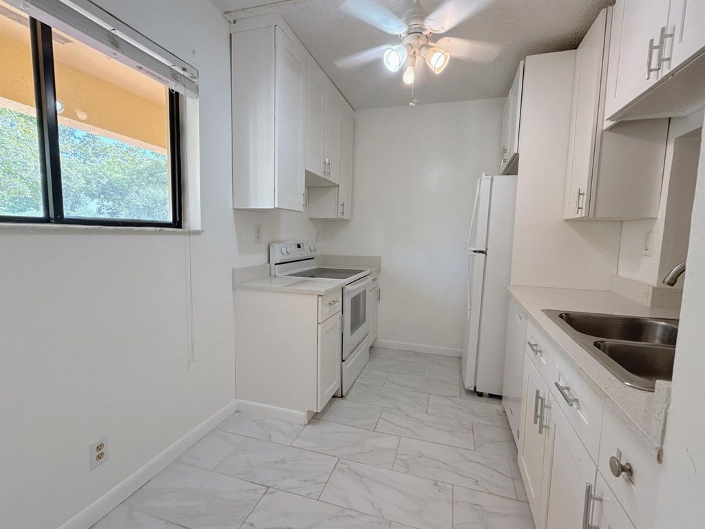 Photo of 924 SW 9th Street Circle #204, Boca Raton, FL 33486 (MLS # R11074762)