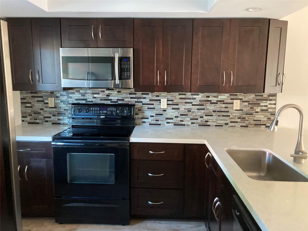 Photo of 9374 SW 3rd Street #704, Boca Raton, FL 33428 (MLS # B26016528)