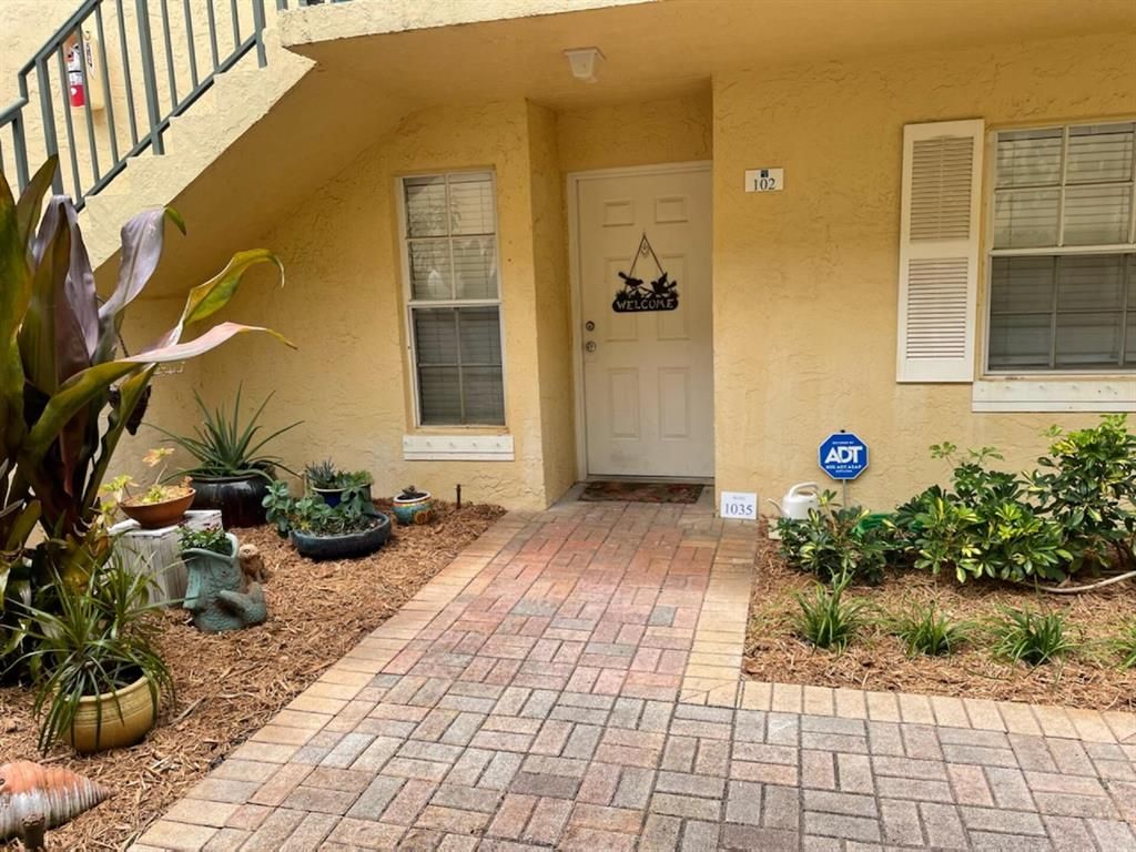 Photo of 1035 Lake Shore Drive #102, Lake Park, FL 33403 (MLS # R10841470)