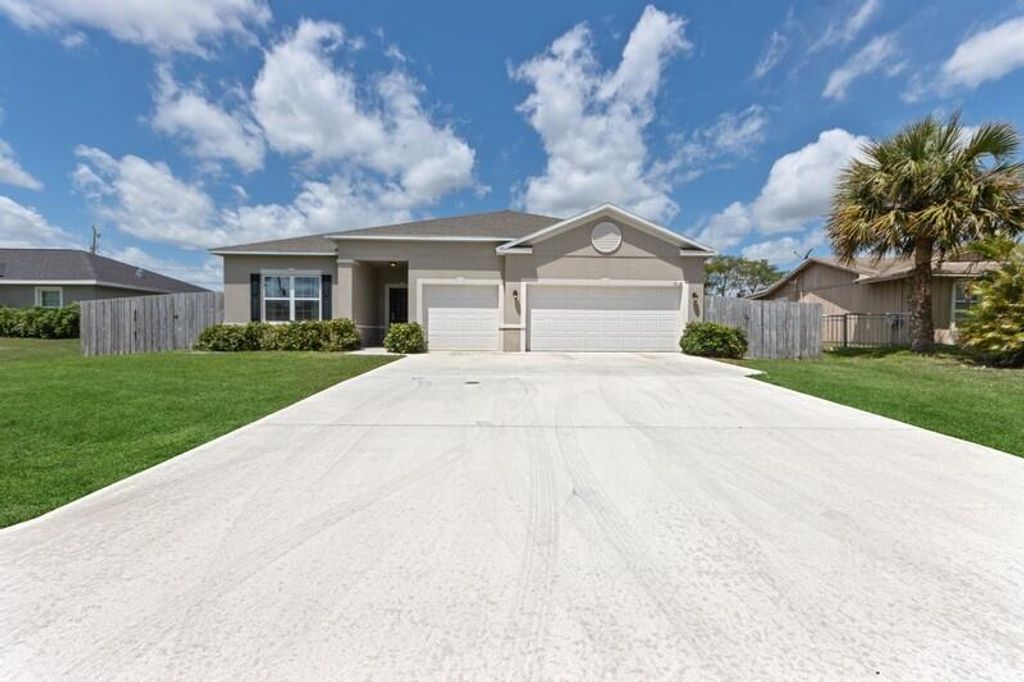 Photo of 3638 SW Vincennes Street, Port Saint Lucie, FL 34984 (MLS # R10711322)