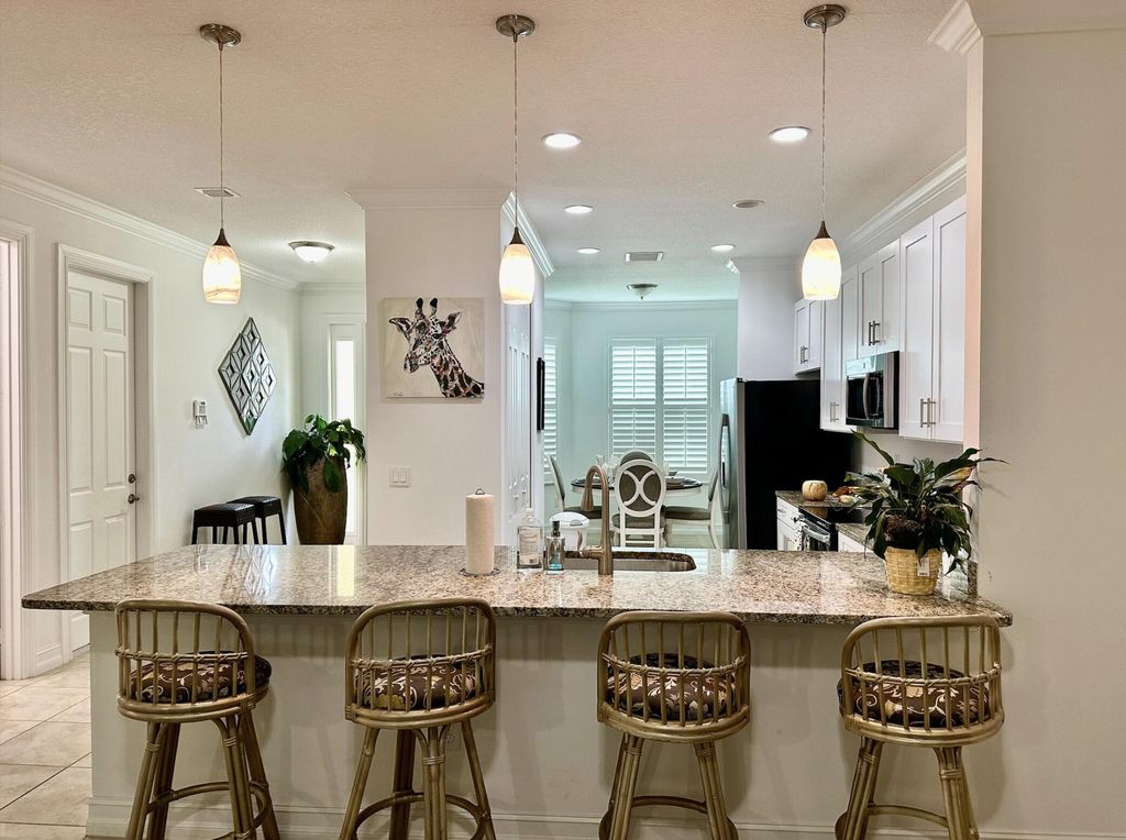 Photo of 6112 NW Cullen Way, Port Saint Lucie, FL 34983 (MLS # B26031103)