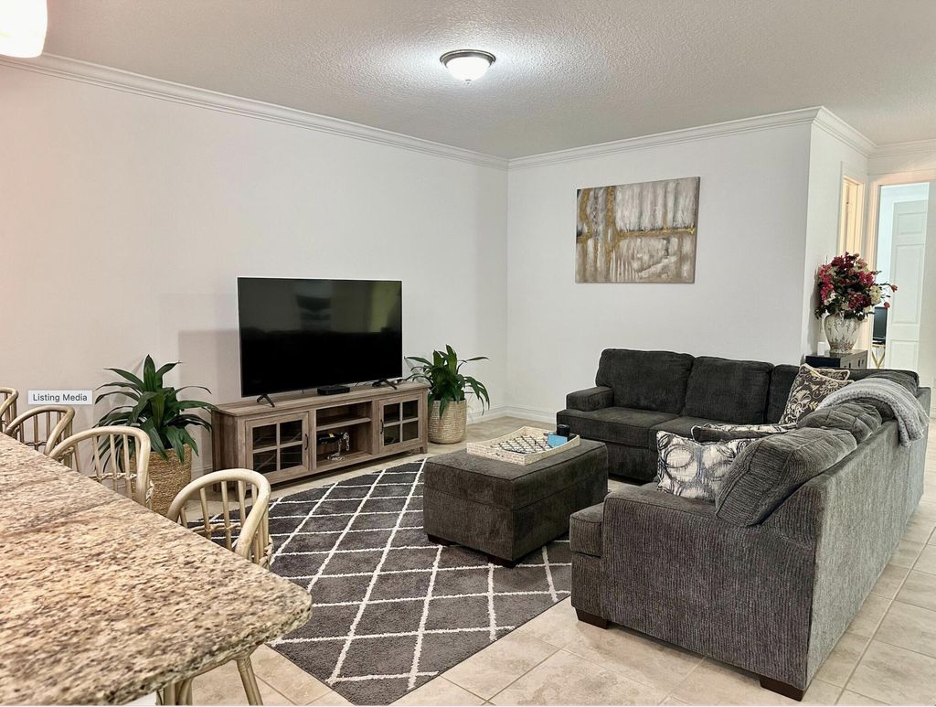Photo of 6112 NW Cullen Way, Port Saint Lucie, FL 34983 (MLS # B26031103)