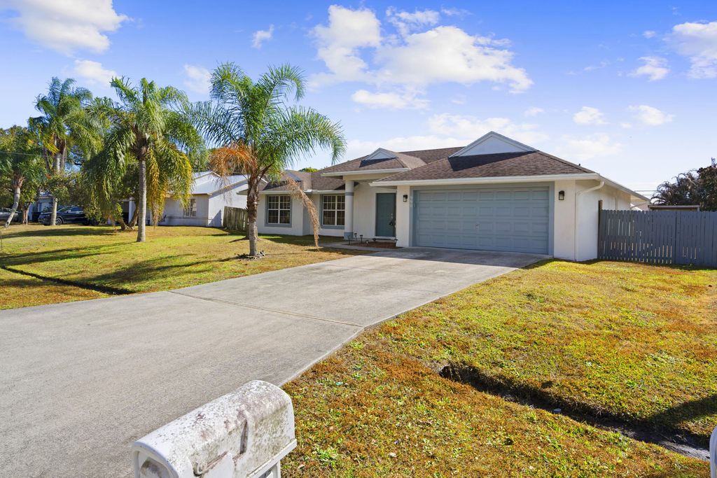 Photo of 990 SW Versailles Avenue, Port Saint Lucie, FL 34953 (MLS # R11164123)