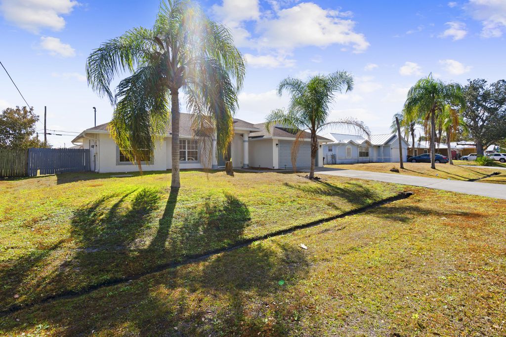 Photo of 990 SW Versailles Avenue, Port Saint Lucie, FL 34953 (MLS # R11164123)