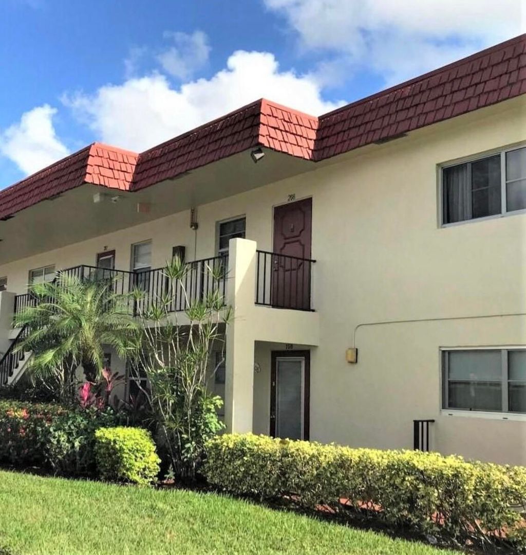 Photo of 19 Abbey Lane, Delray Beach, FL 33446 (MLS # B26028905)